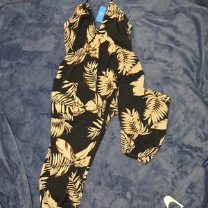 Cupshe Black Jumpsuit with Tan Tropical Leaf Print